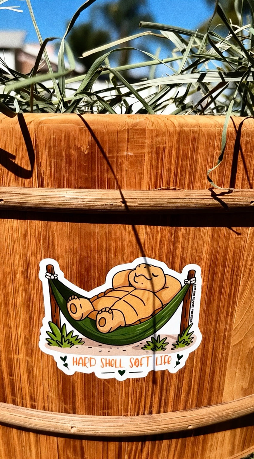 Real sticker on wooden planter outdoors